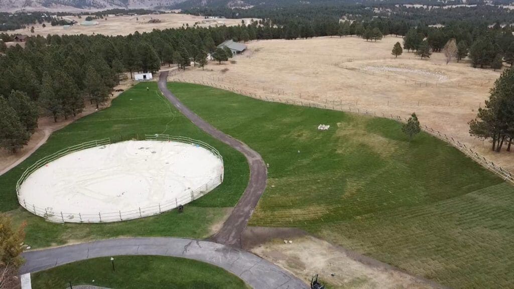 Aerial shot of fresh green field in western south dakota maintained by A&M Yardwork